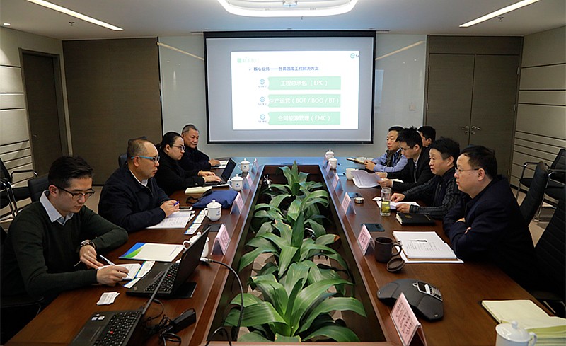 熊良虎会见中建材（北京）沙巴公司董事长泥卫东