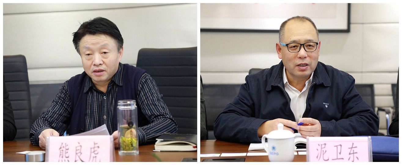 熊良虎会见中建材（北京）沙巴公司董事长泥卫东